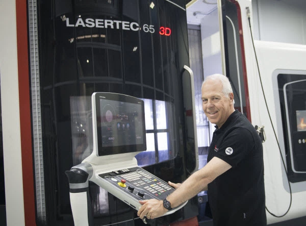 Man in front of Lasertec 65