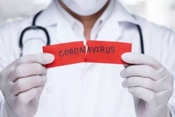 Doctor holding a paper with word of Corona virus