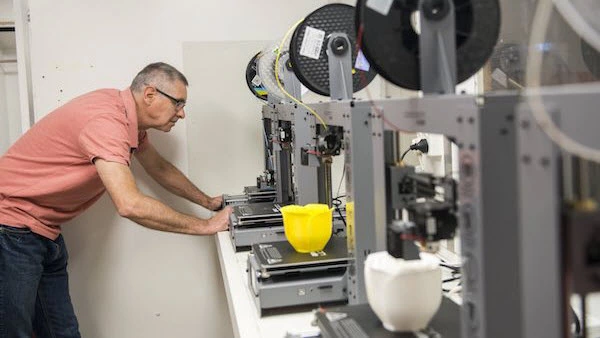 Man inspecting the machine