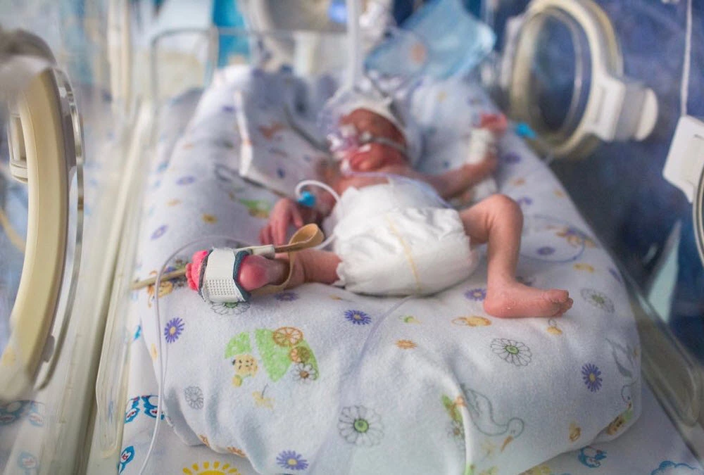 Baby confined in a hospital